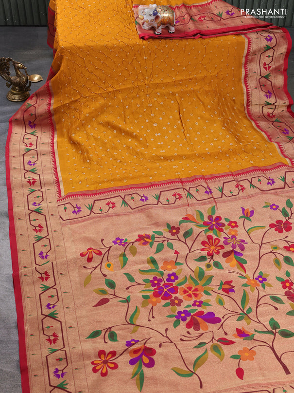 Dola silk saree mustard yellow and red with allover bandhani prints and paithani border