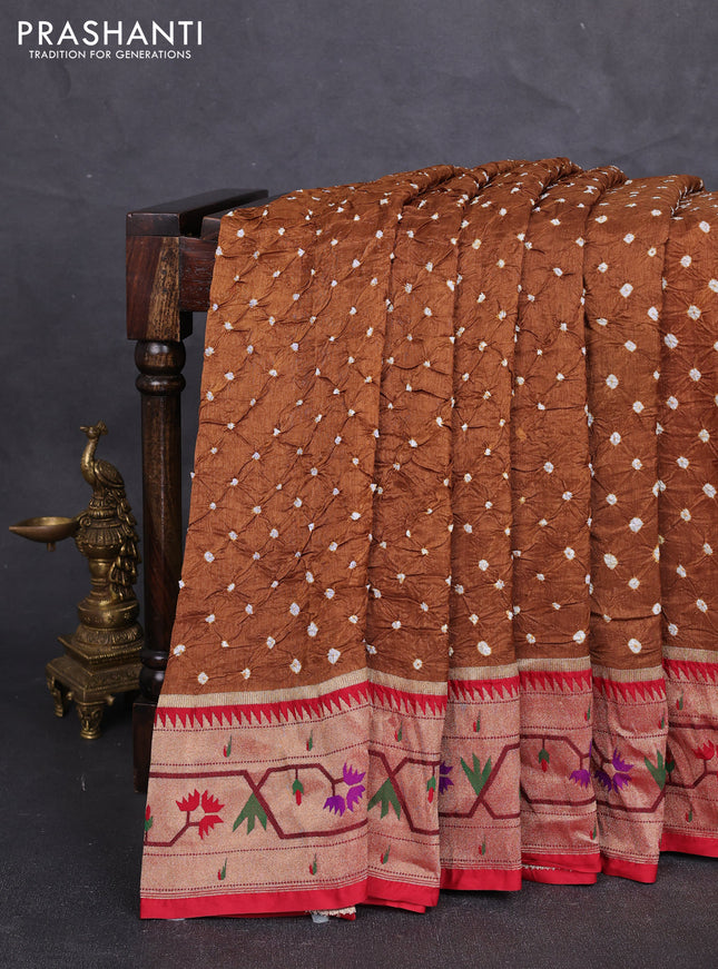 Dola silk saree dark mustard shade and red with allover bandhani prints and paithani border
