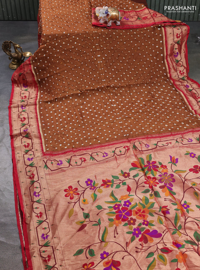 Dola silk saree dark mustard shade and red with allover bandhani prints and paithani border