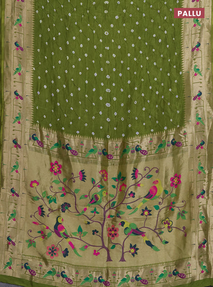 Dola silk saree light green with allover bandhani prints and paithani border