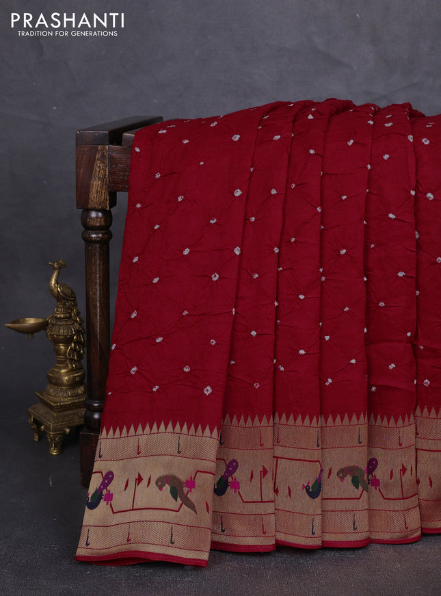 Dola silk saree red with allover bandhani prints and paithani border