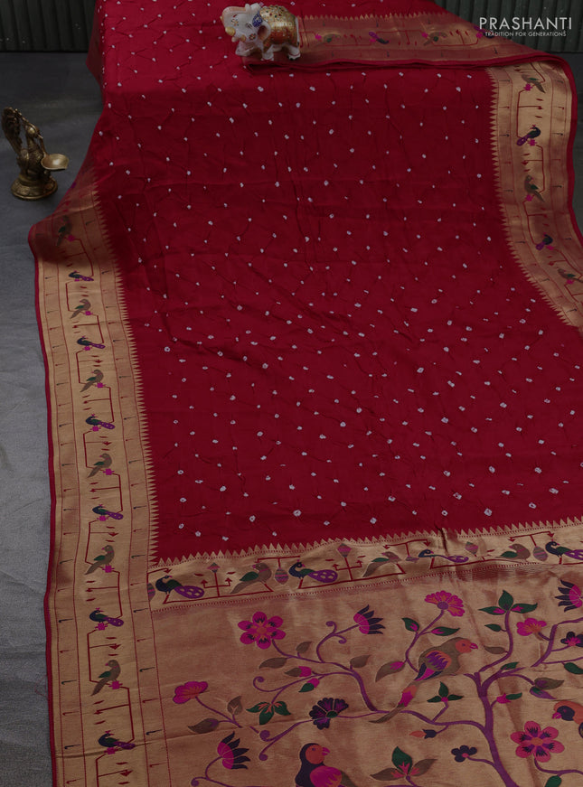 Dola silk saree red with allover bandhani prints and paithani border