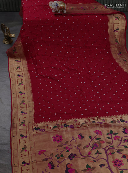 Dola silk saree red with allover bandhani prints and paithani border