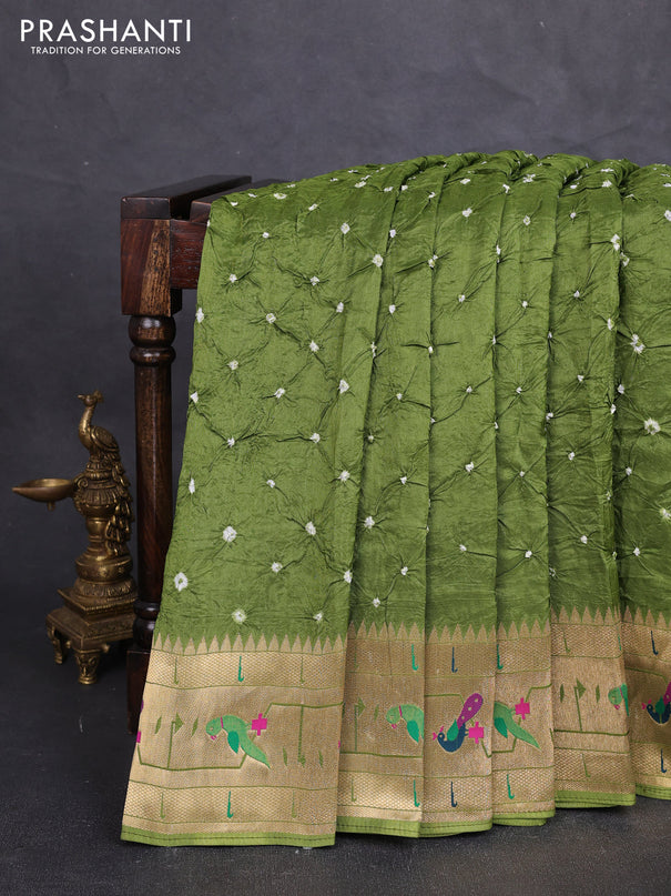 Dola silk saree green with allover bandhani prints and paithani border