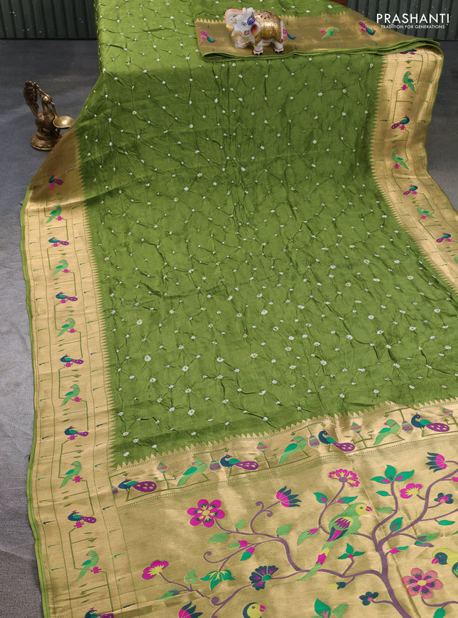 Dola silk saree green with allover bandhani prints and paithani border