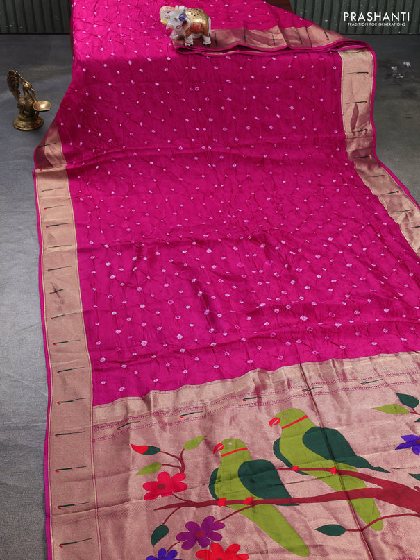 Dola silk saree dark pink with allover bandhani prints and muniya butta border