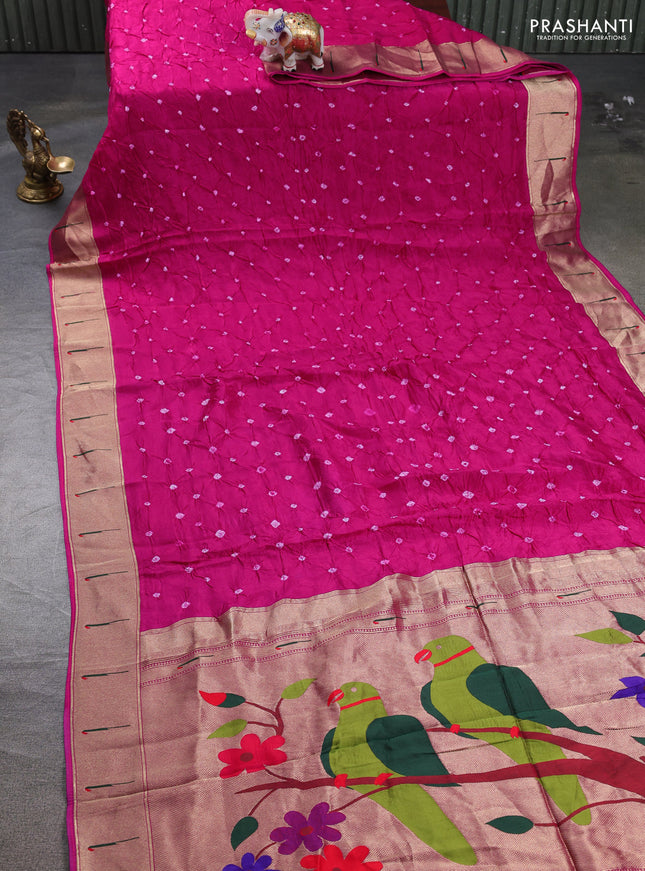 Dola silk saree dark pink with allover bandhani prints and muniya butta border