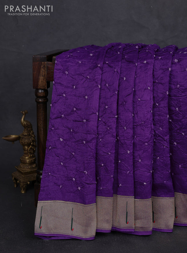 Dola silk saree purple with allover bandhani prints and muniya butta border