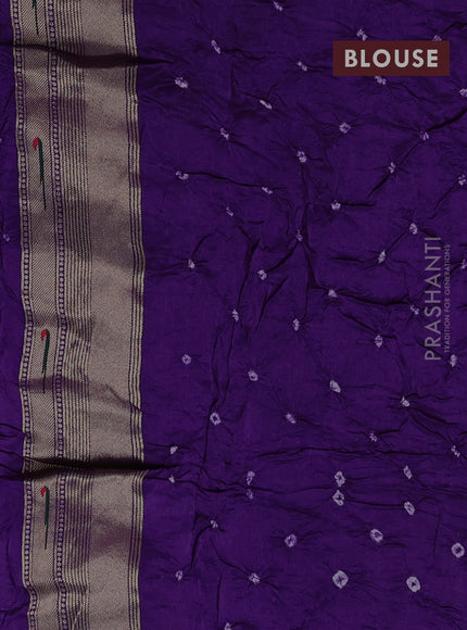 Dola silk saree purple with allover bandhani prints and muniya butta border
