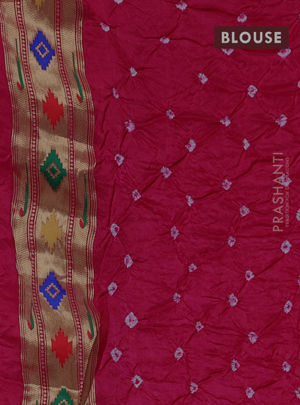 Dola silk saree pink with allover bandhani prints and muniya butta border
