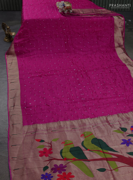 Dola silk saree rani pink with allover bandhani prints and muniya butta border