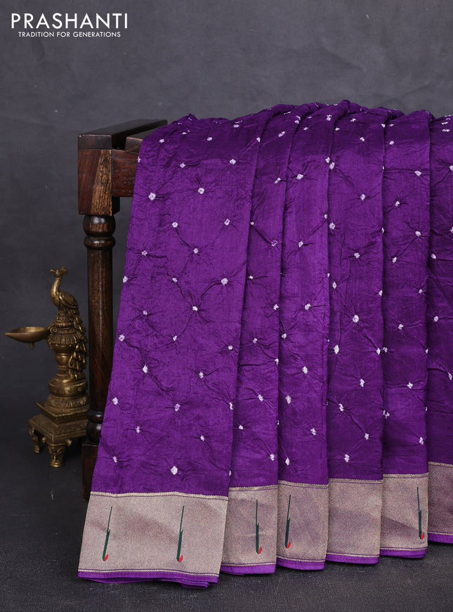 Dola silk saree purple with allover bandhani prints and muniya butta border