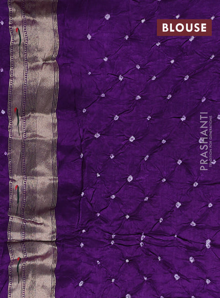 Dola silk saree purple with allover bandhani prints and muniya butta border