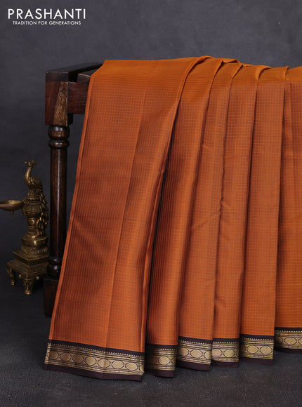 Pure kanchipuram silk saree rustic orange and coffee brown with allover zari small checked pattern and small zari woven korvai border