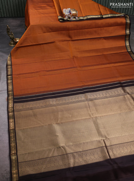 Pure kanchipuram silk saree rustic orange and coffee brown with allover zari small checked pattern and small zari woven korvai border