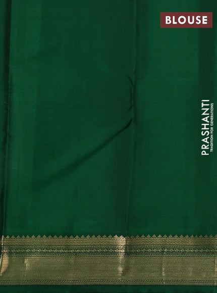 Pure kanchipuram silk saree pastel green and bottle green with allover zari stripe pattern and zari woven korvai border