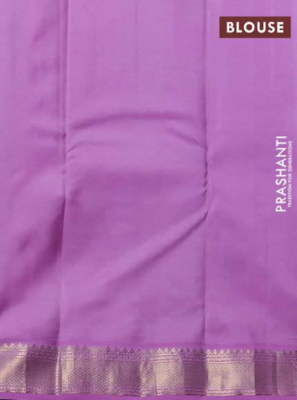 Pure kanchipuram silk saree teal blue and lavender with allover zari woven buttas and zari woven korvai border