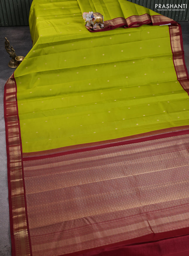 Pure kanchipuram silk saree light green and deep maroon with allover zari woven buttas and zari woven korvai border