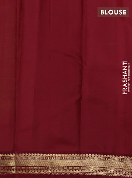 Pure kanchipuram silk saree light green and deep maroon with allover zari woven buttas and zari woven korvai border