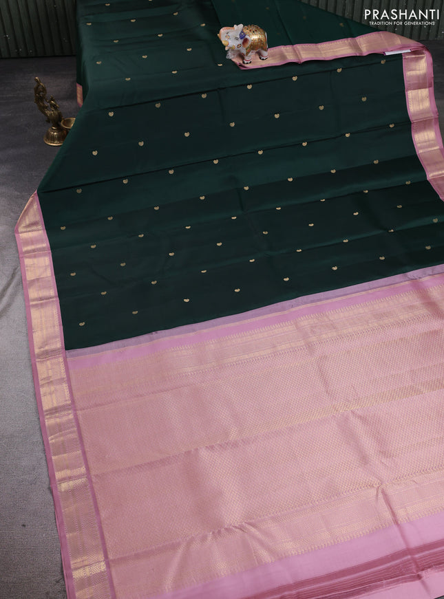 Pure kanchipuram silk saree bottle green and pastel pink with allover paisley zari woven buttas and zari woven korvai border