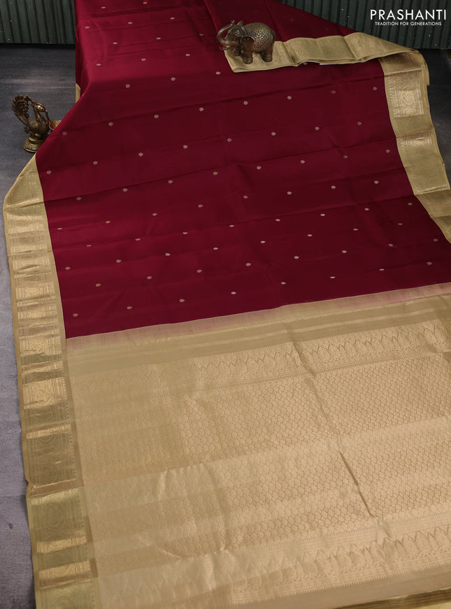 Pure kanchipuram silk saree deep maroon and sandal with allover zari woven buttas and zari woven korvai border