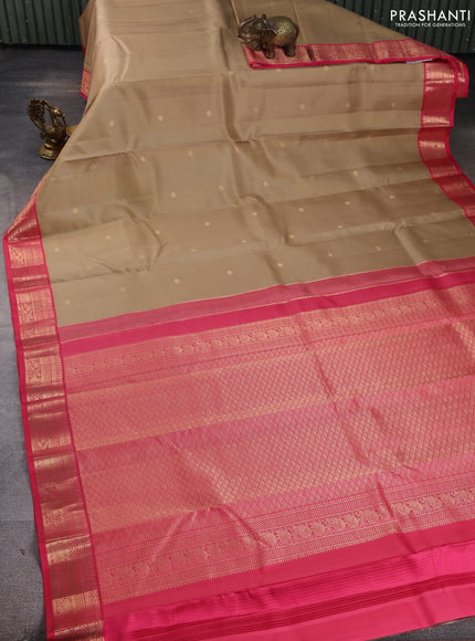 Pure kanchipuram silk saree sandal and pink with allover vairaosi pattern & zari buttas and zari woven korvai border