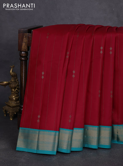 Pure kanchipuram silk saree red and teal blue with allover zari stripe pattern & buttas and zari woven korvai border