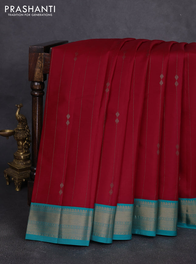 Pure kanchipuram silk saree red and teal blue with allover zari stripe pattern & buttas and zari woven korvai border