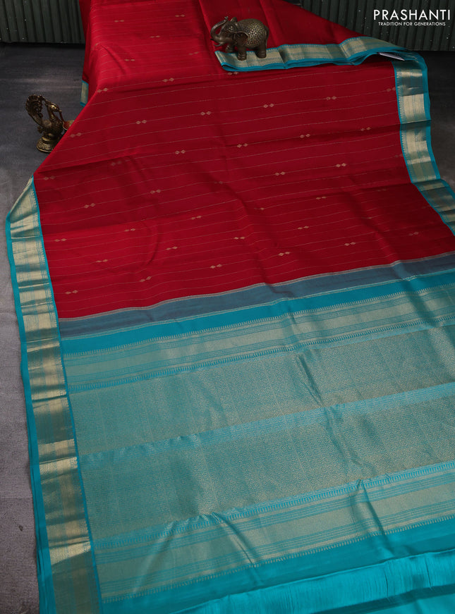 Pure kanchipuram silk saree red and teal blue with allover zari stripe pattern & buttas and zari woven korvai border