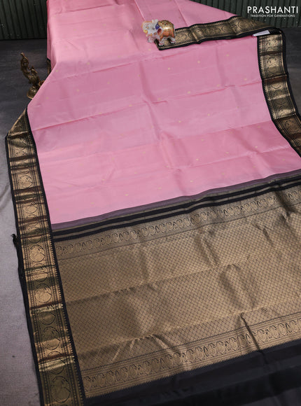 Pure kanchipuram silk saree pastel pink and black with allover zari woven buttas and zari woven korvai border