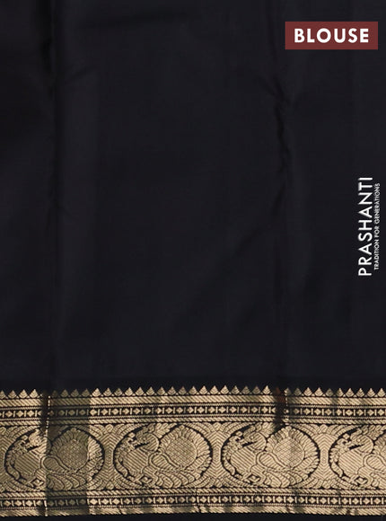 Pure kanchipuram silk saree pastel pink and black with allover zari woven buttas and zari woven korvai border