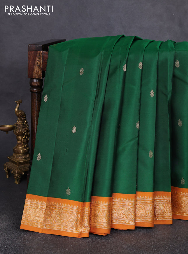 Pure kanchipuram silk saree lime yellow and black with allover paisley zari woven buttas and zari woven korvai border
