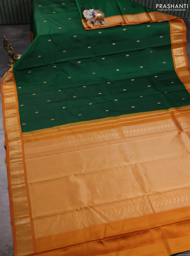 Pure kanchipuram silk saree lime yellow and black with allover paisley zari woven buttas and zari woven korvai border