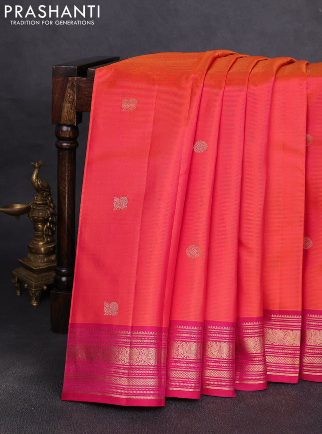 Pure kanchipuram silk saree dual shade of pinkish orange and dark pink with allover vairaosi pattern & zari buttas and zari woven korvai border
