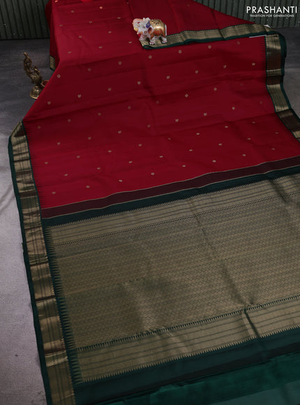 Pure kanchipuram silk saree red and bottle green with allover zari woven buttas and temple design zari woven korvai border