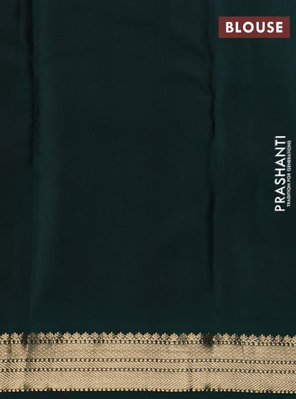 Pure kanchipuram silk saree red and bottle green with allover zari woven buttas and temple design zari woven korvai border