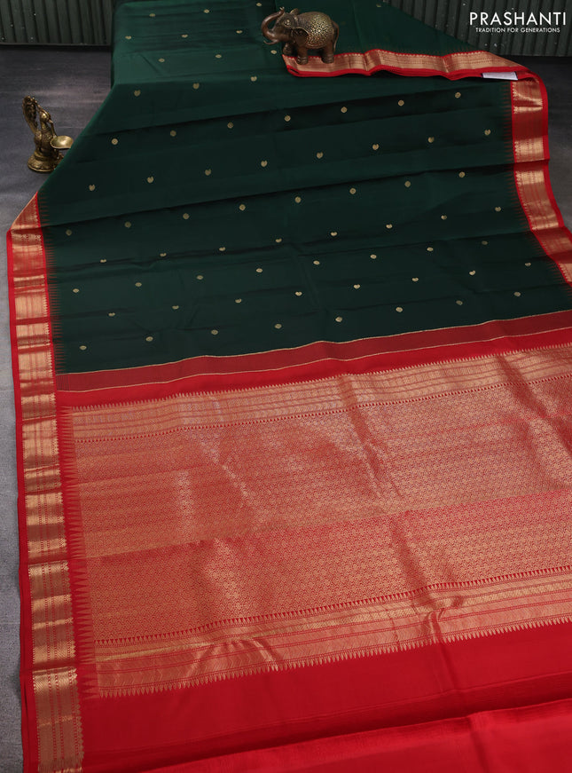 Pure kanchipuram silk saree bottle green and red with allover zari woven buttas and temple design zari woven korvai border