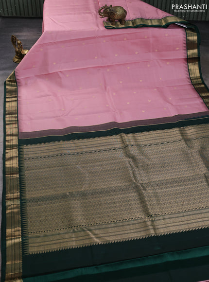 Pure kanchipuram silk saree pastel pink and bottle green with allover zari woven buttas and temple design zari woven korvai border
