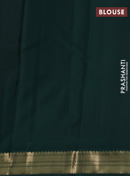 Pure kanchipuram silk saree pastel pink and bottle green with allover zari woven buttas and temple design zari woven korvai border