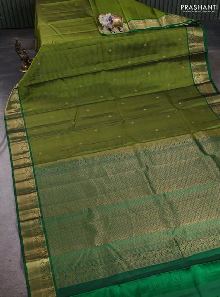 Pure kanchipuram silk saree mehendi green and green with allover zari stripe pattern & buttas and zari woven korvai border