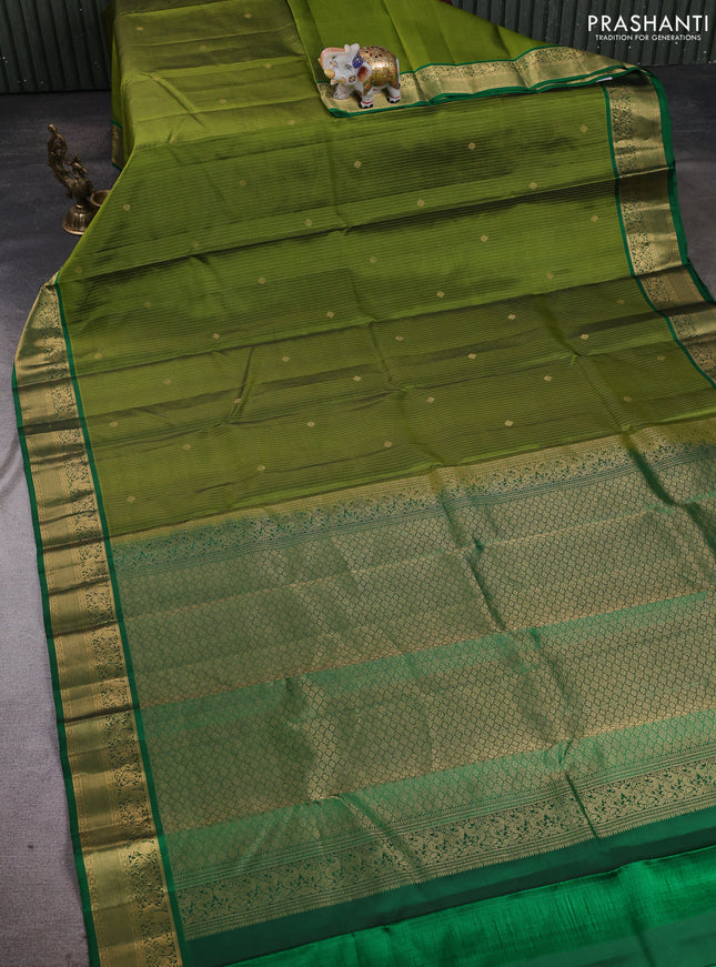 Pure kanchipuram silk saree mehendi green and green with allover zari stripe pattern & buttas and zari woven korvai border