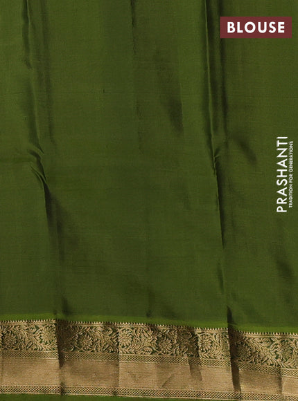 Pure kanchipuram silk saree rust shade and light green with allover zari stripe pattern & buttas and zari woven korvai border