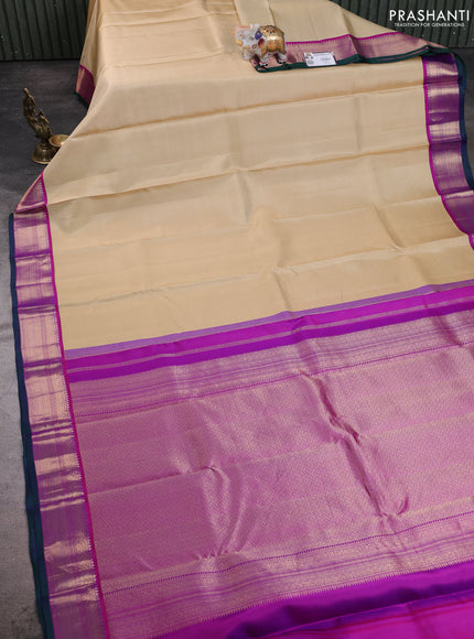 Pure kanchipuram silk saree beige and dark pink with allover zari stripe pattern and zari woven korvai border