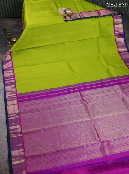 Pure kanchipuram silk saree light green and dark pink with allover zari stripe pattern and zari woven korvai border