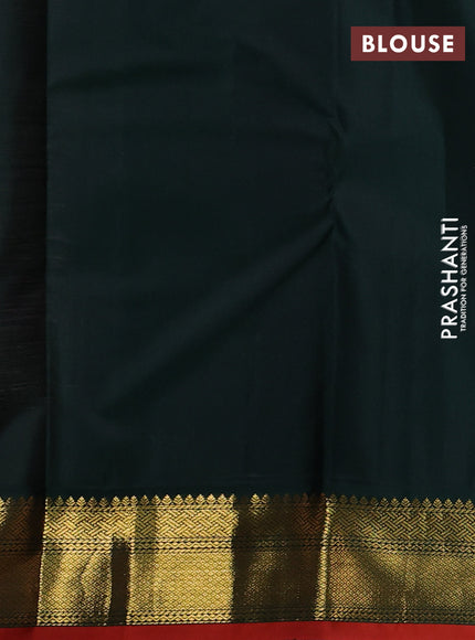 Pure kanchipuram silk saree pastel pink and bottle green wwith allover zari stripe pattern and zari woven korvai border