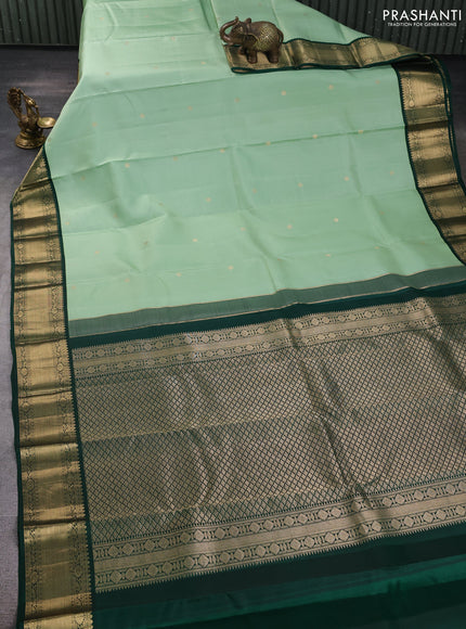 Pure kanchipuram silk saree pista green and bottle green with zari woven buttas and temple design zari woven korvai border