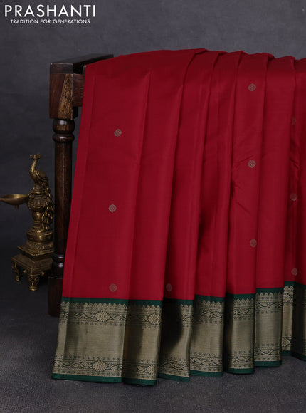 Pure kanchipuram silk saree red and bottle green with zari woven buttas and temple design zari woven korvai border