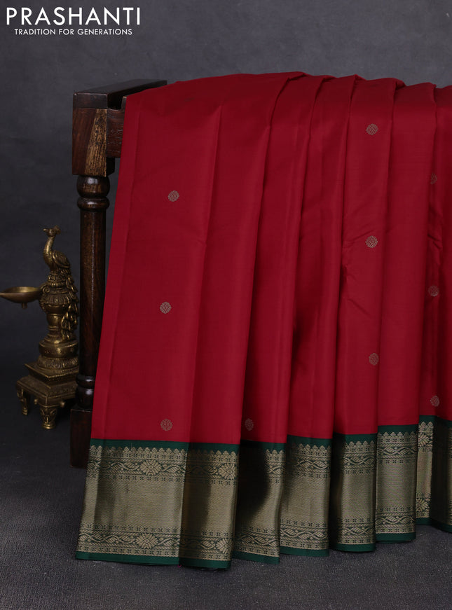 Pure kanchipuram silk saree red and bottle green with zari woven buttas and temple design zari woven korvai border