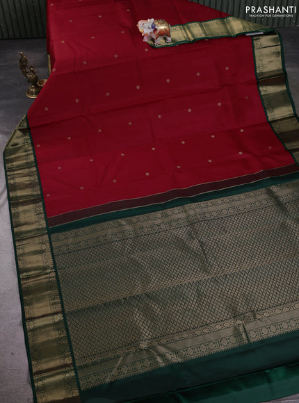 Pure kanchipuram silk saree red and bottle green with zari woven buttas and temple design zari woven korvai border