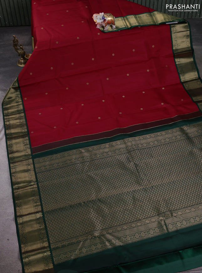 Pure kanchipuram silk saree red and bottle green with zari woven buttas and temple design zari woven korvai border